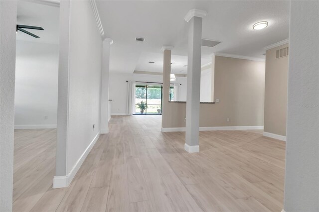 13303 Swiftwater Way, Lakewood Ranch, FL 34211 - unfurnished living room featuring ornamental molding, a ceiling fan, light wood-type flooring, and baseboards