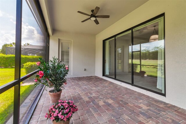13303 Swiftwater Way, Lakewood Ranch, FL 34211 - unfurnished sunroom with ceiling fan