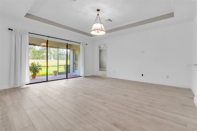 13303 Swiftwater Way, Lakewood Ranch, FL 34211 - unfurnished room with a raised ceiling and baseboards