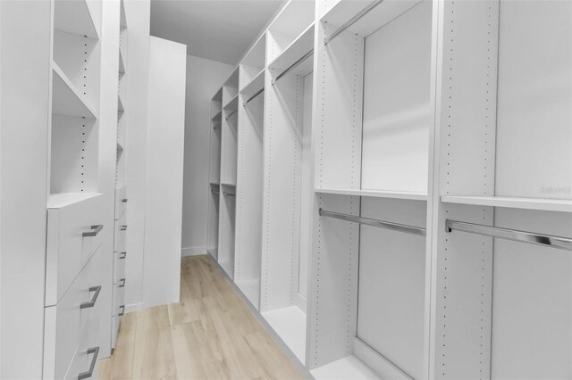 13303 Swiftwater Way, Lakewood Ranch, FL 34211 - walk in closet with light wood finished floors
