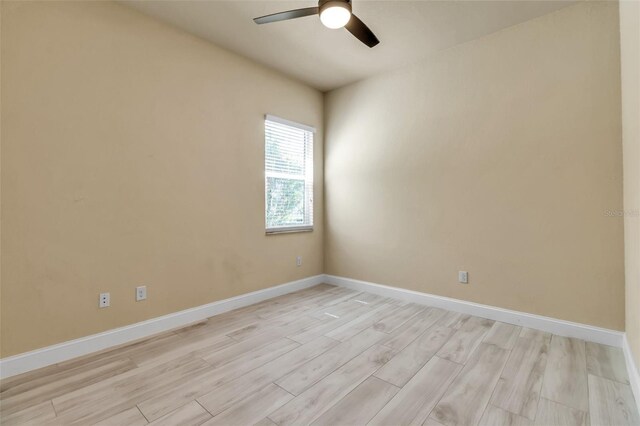 13303 Swiftwater Way, Lakewood Ranch, FL 34211 - empty room with a ceiling fan, light wood-type flooring, and baseboards