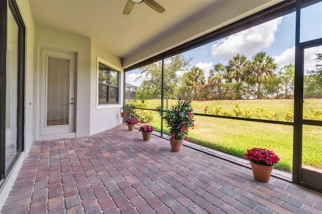 13303 Swiftwater Way, Lakewood Ranch, FL 34211 - unfurnished sunroom with ceiling fan