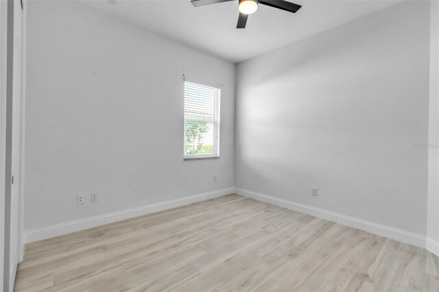 13303 Swiftwater Way, Lakewood Ranch, FL 34211 - empty room featuring light wood-type flooring, a ceiling fan, and baseboards