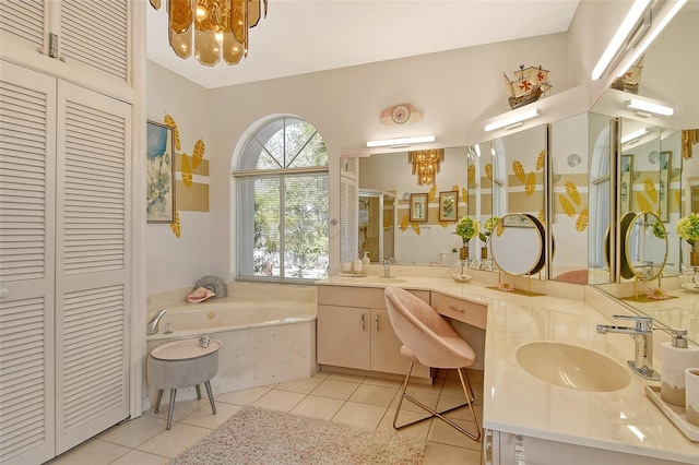 bathroom featuring tile patterned flooring, vanity, shower with separate bathtub, and a chandelier