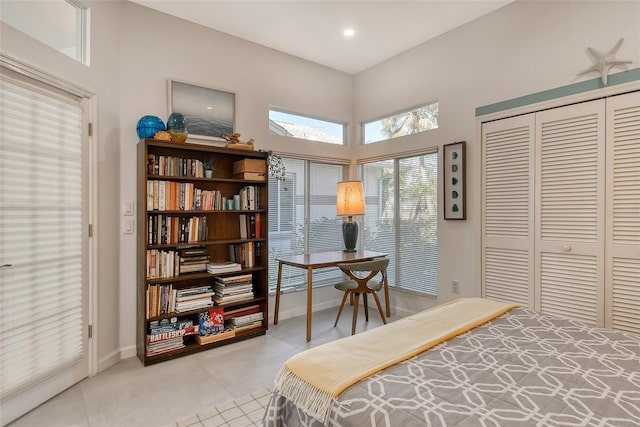 bedroom with light tile patterned floors