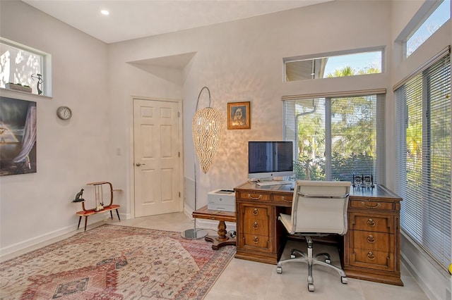 tiled office with a high ceiling