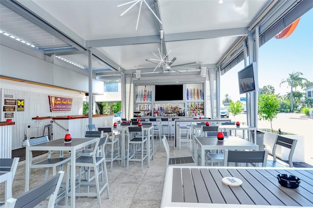 view of patio / terrace featuring ceiling fan