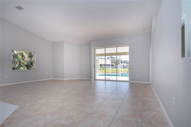 empty room featuring light tile patterned floors