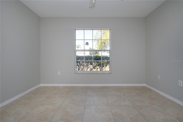 view of tiled spare room