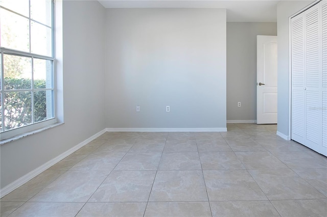 view of tiled spare room