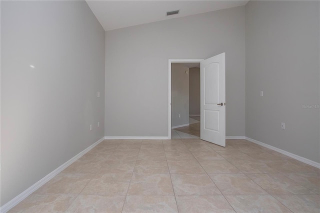 empty room featuring light tile patterned floors