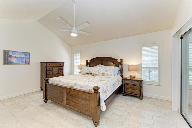 bedroom featuring ceiling fan and vaulted ceiling