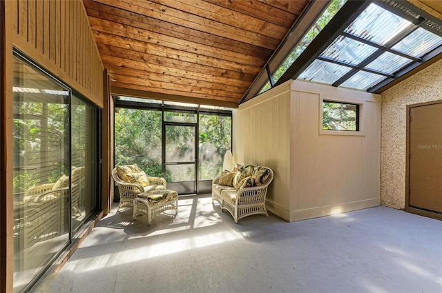 unfurnished sunroom featuring vaulted ceiling and wooden ceiling