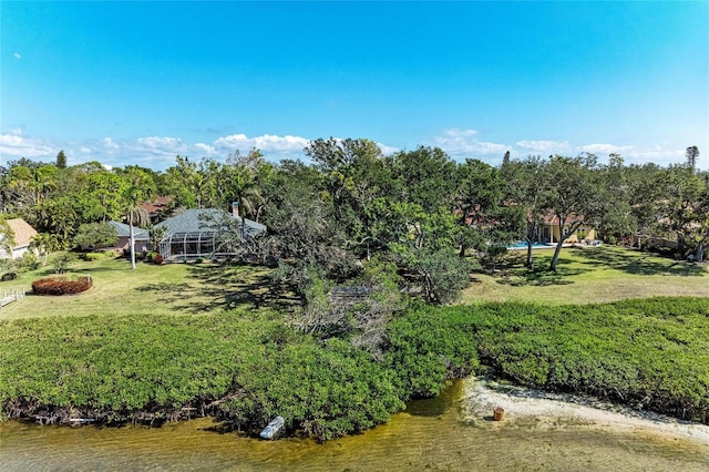 birds eye view of property featuring a water view