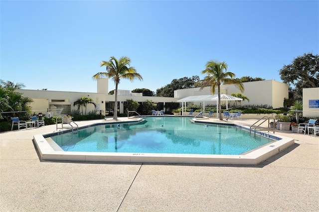 pool with a patio