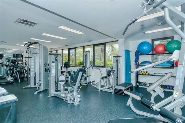 workout area featuring visible vents