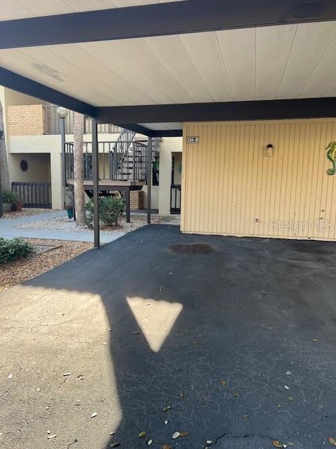 view of patio / terrace with a carport