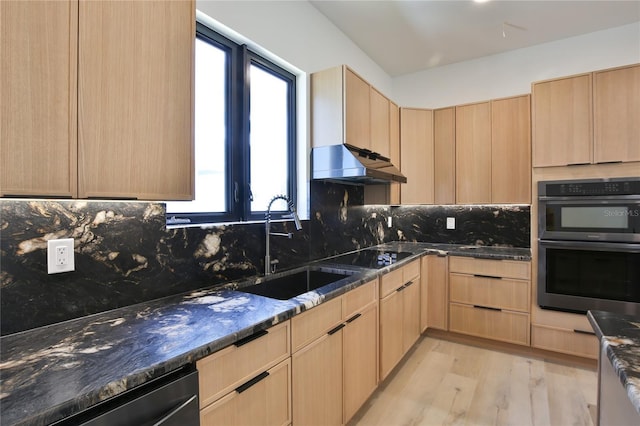 kitchen featuring sink, black appliances, and light brown cabinets