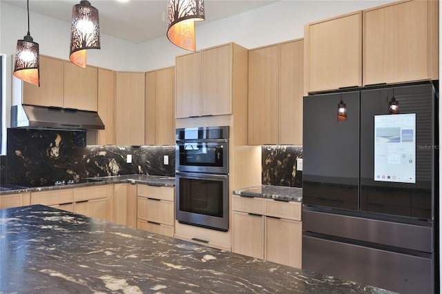 kitchen with appliances with stainless steel finishes, backsplash, light brown cabinetry, and dark stone counters