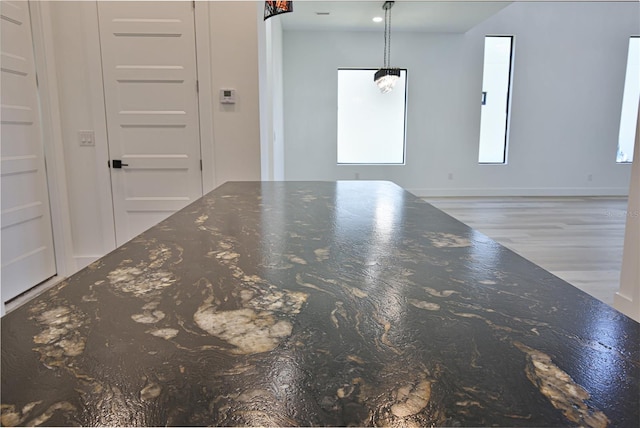 unfurnished room featuring light hardwood / wood-style floors