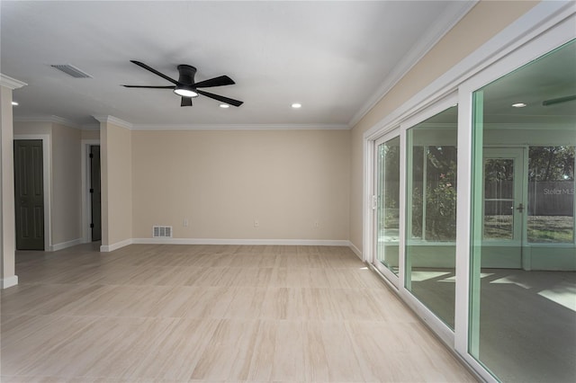 unfurnished room featuring crown molding and ceiling fan