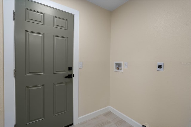 laundry room featuring electric dryer hookup and washer hookup