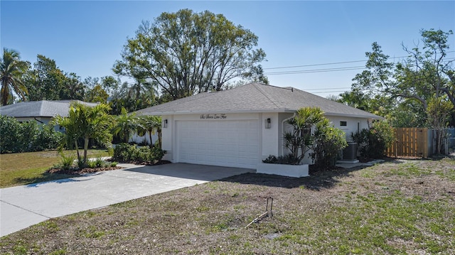 view of side of home with a yard and a garage