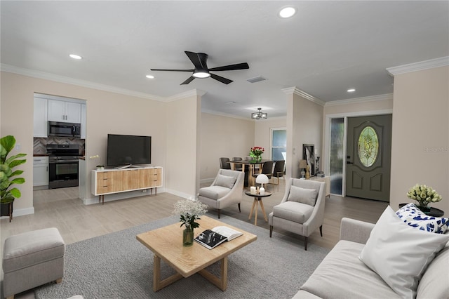 living room featuring light wood-type flooring, recessed lighting, visible vents, and crown molding