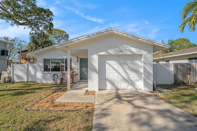 view of front facade featuring a garage and a front yard