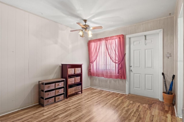 interior space featuring hardwood / wood-style floors and ceiling fan