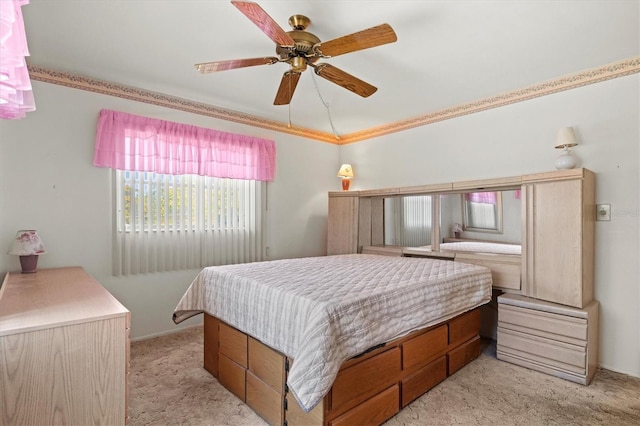 carpeted bedroom with ceiling fan