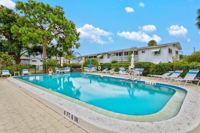 view of pool featuring a patio area