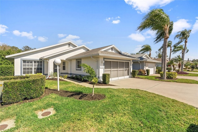 ranch-style house with a garage and a front yard