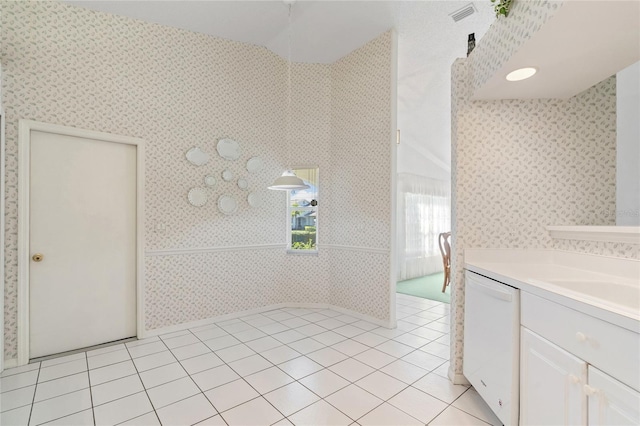 bathroom featuring tile patterned floors and vanity