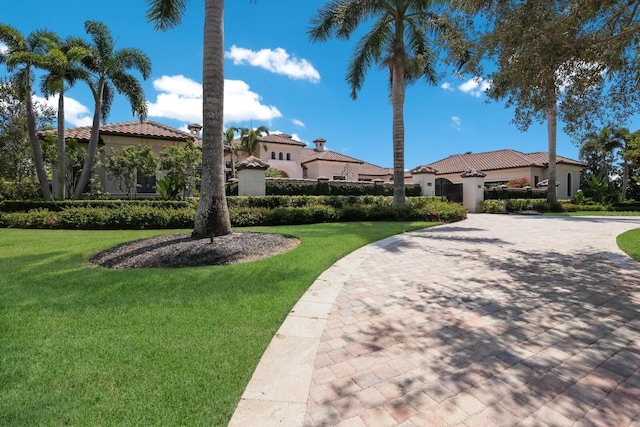 exterior space featuring a front lawn