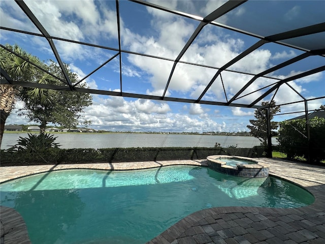 7760 Grande Shores Dr, Sarasota, FL 34240 - view of swimming pool featuring a water view, glass enclosure, a pool with connected hot tub, and a patio area