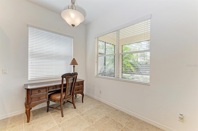 office with baseboards and light tile patterned flooring