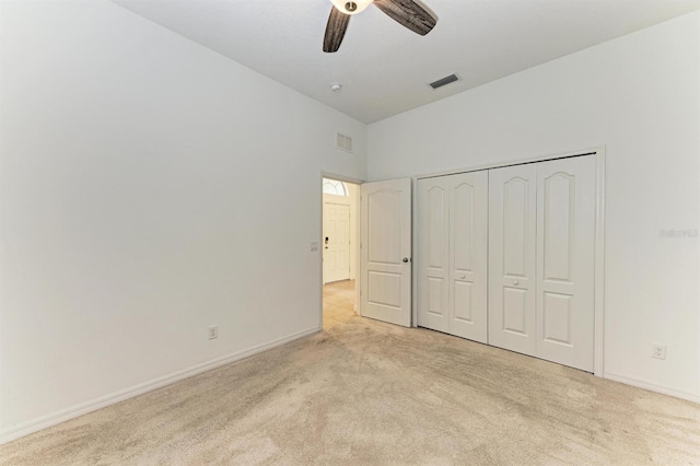 unfurnished bedroom with visible vents, baseboards, and carpet