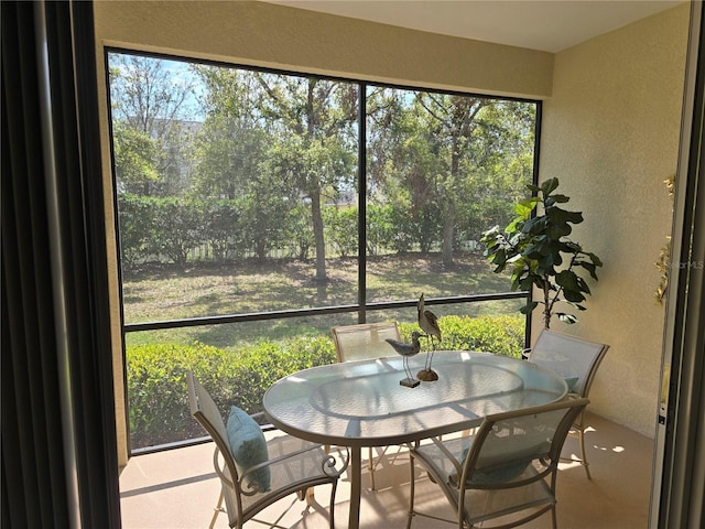 sunroom featuring a wealth of natural light