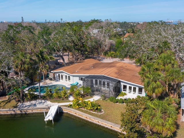 drone / aerial view with a water view