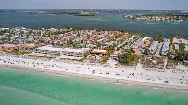 aerial view featuring a water view and a beach view