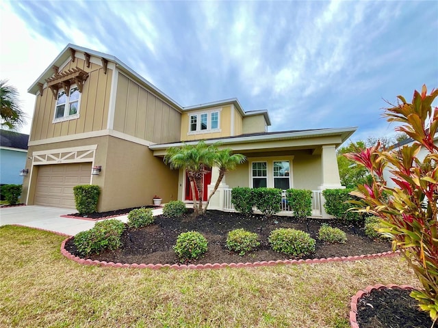 view of front of house featuring a garage and a front yard