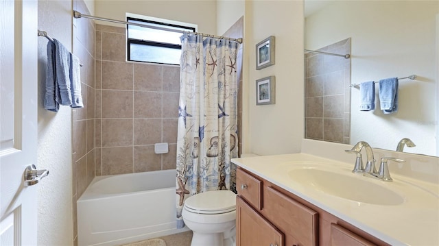 full bathroom with shower / tub combo, vanity, and toilet