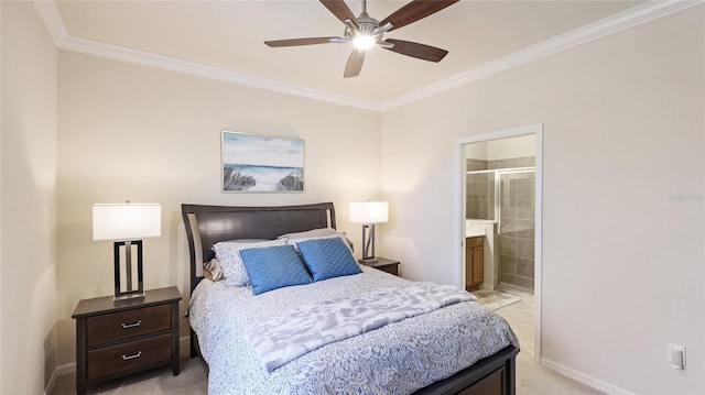 bedroom featuring light colored carpet, ornamental molding, ceiling fan, and ensuite bathroom