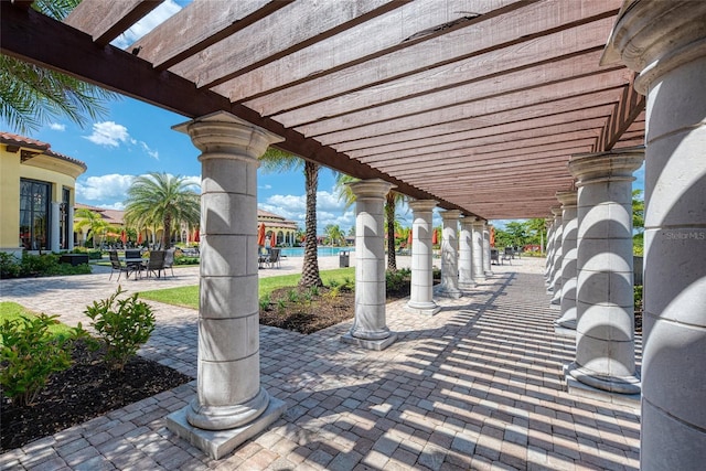 view of patio featuring a pergola