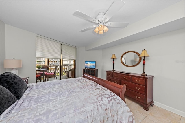 bedroom featuring ceiling fan and light tile patterned floors