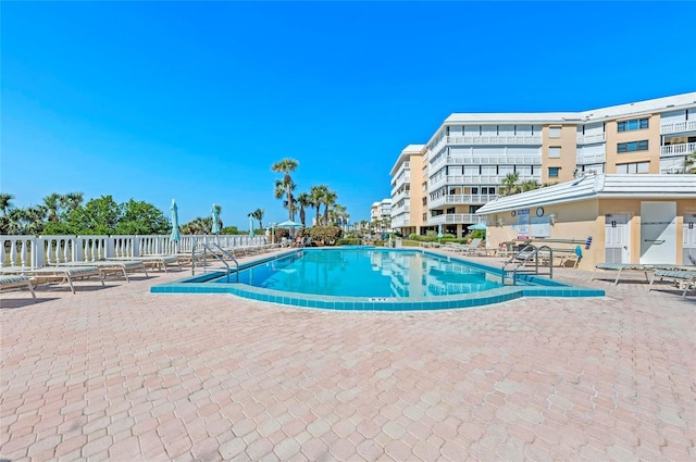 view of swimming pool featuring a patio