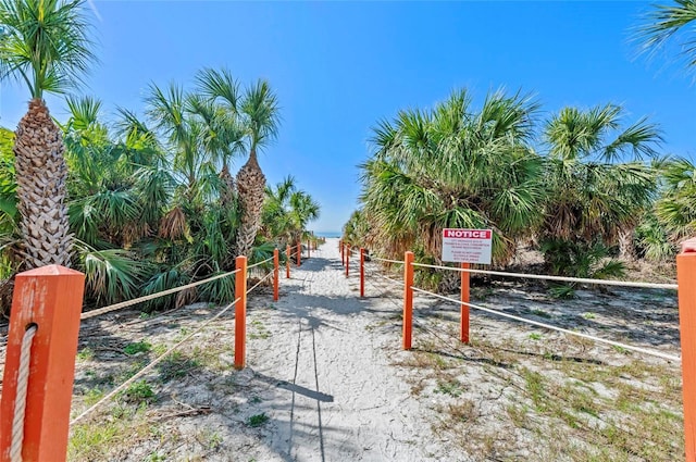 surrounding community featuring a water view