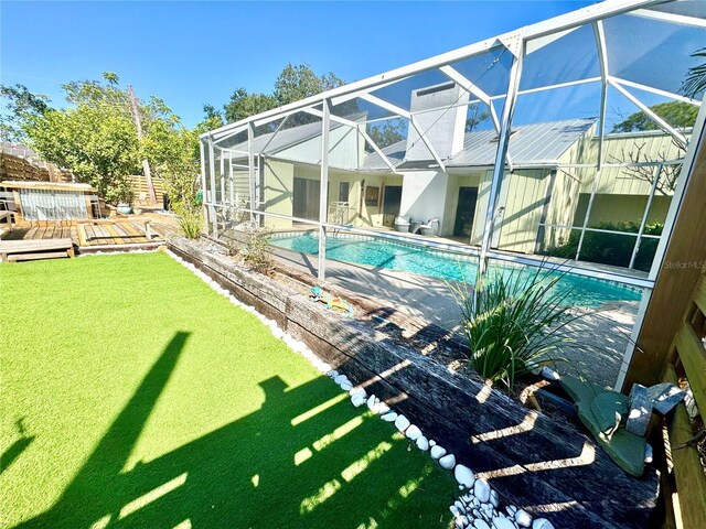 2375 Riverwood Pines Dr, Sarasota, FL 34231 - view of pool with a yard, a lanai, and a deck