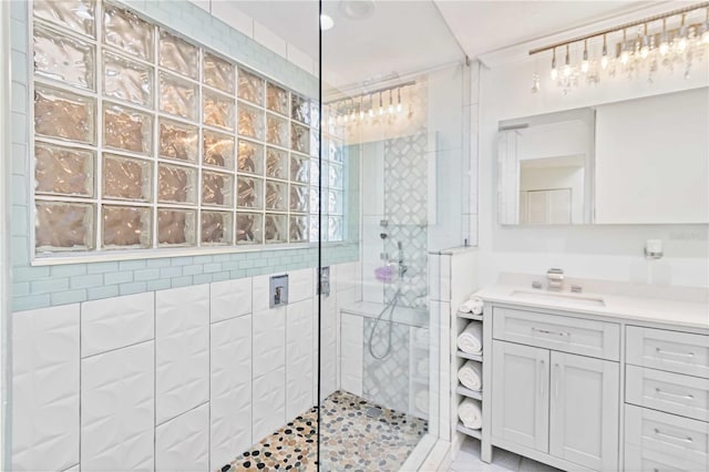 2375 Riverwood Pines Dr, Sarasota, FL 34231 - bathroom with vanity and a tile shower